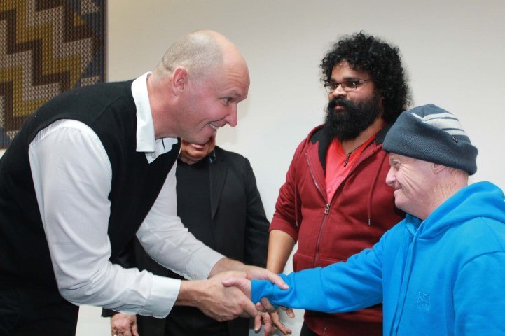 People meeting at a powhiri