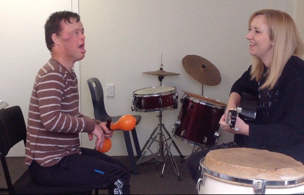 two people playing music